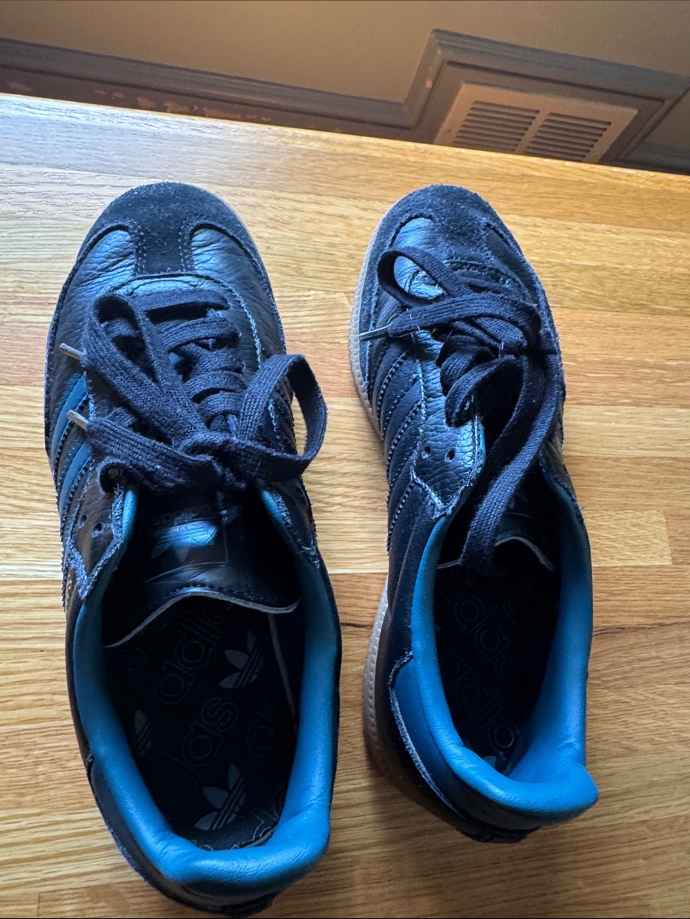 adidas Black Athletic Sneakers with Blue Inner Collar